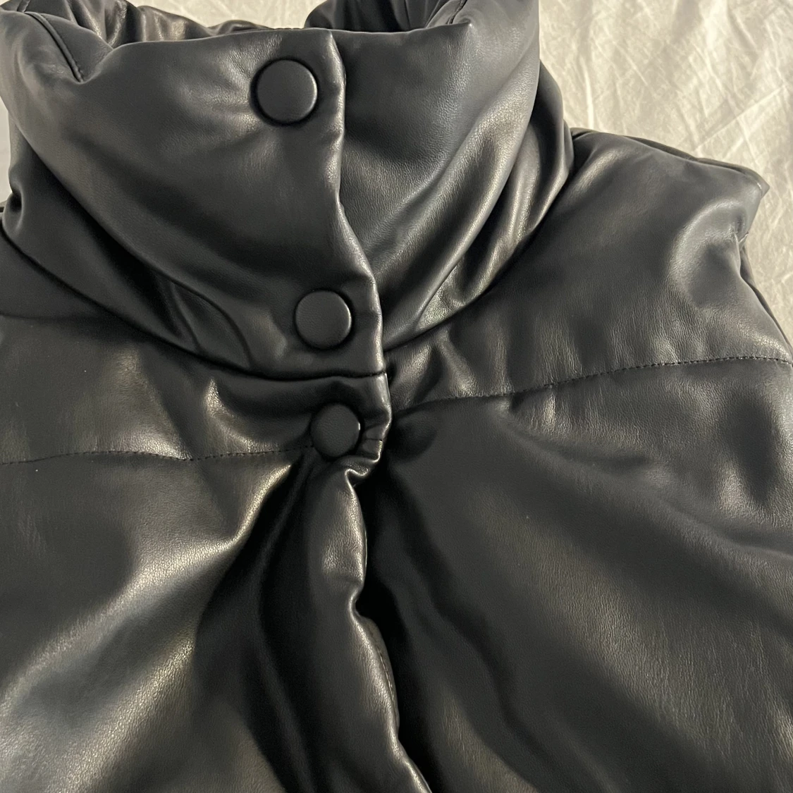 Svart vadderad Pu väst - 91