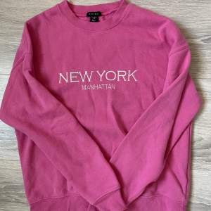 En rosa sweatshirt, använd ca två gånger