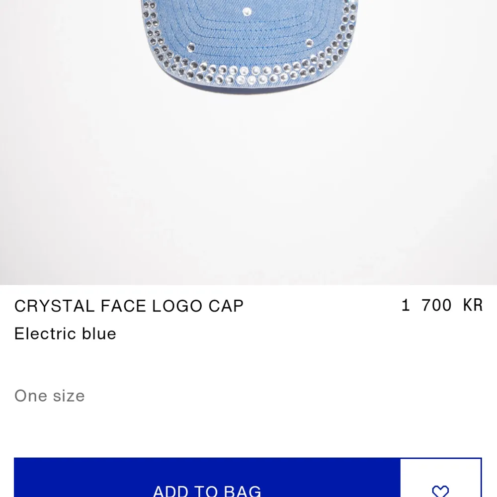 New Acne Studios cap in blue and with silver stones embellishments. The lagom face on front. One stone is loose, but there are extra silver stones in the hangtag. Can send more photos. 100% new condition. Can be slightly flexible with the price :). Övrigt.