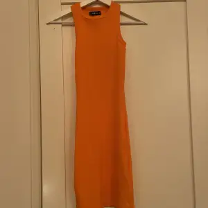 Orange fin klänning oanvänd med prislapp