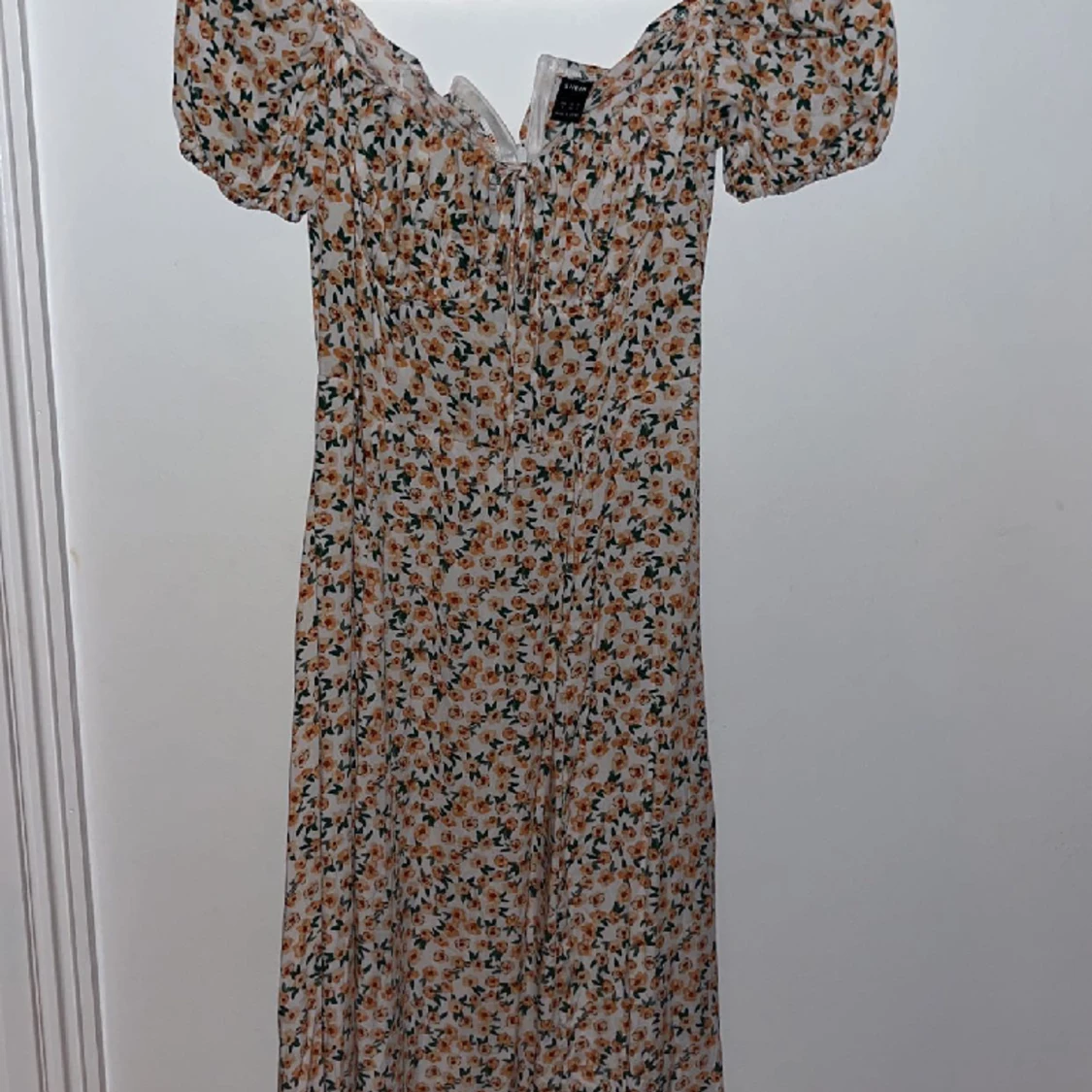 Blommig klänning - 90