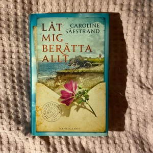 Låt mig berätta allt av Caroline Säfstrand - Inbunden bok i fint skick + signerad!!😊 Frakt tillkommer.