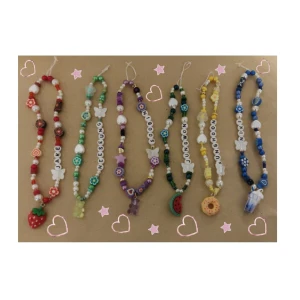 Kpop phonecharms  - Kpop phonecharms av 5 enhypen medlemmar och 1 txt medlem. Olika färger på alla och är 15 cm lång men tråden är olikt lång på alla. 