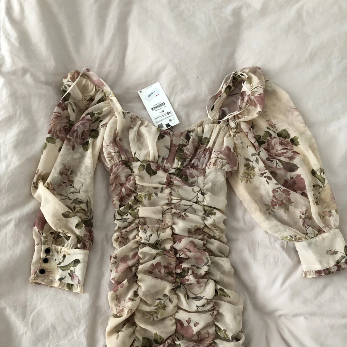 Blommig klänning Zara