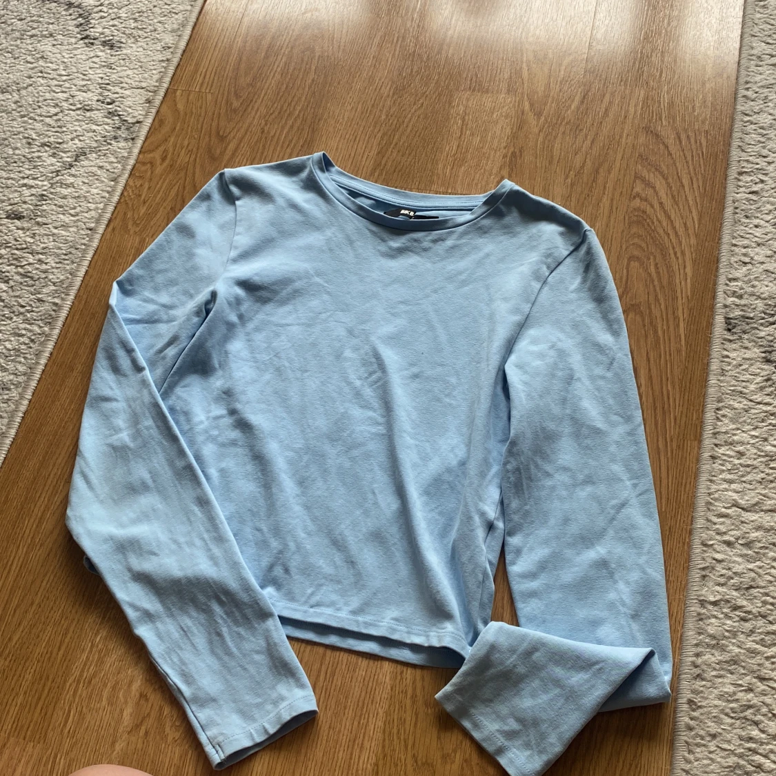 Blå långärmad topp från Bikbok 