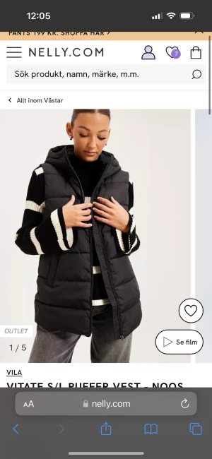 Väst  - Svart väst från Vila. Använd fåtal gånger 