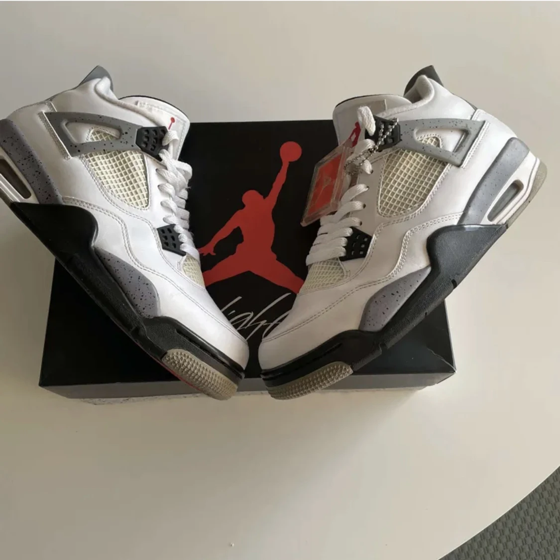 Jordan 4 white cement