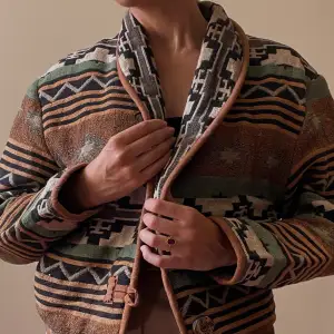 Vintage Jacquard blazer with shawl collar. Large Wooden Button Detail Closure. Best worn oversized for a casual 90s look. Model is 160cm (5”3) and generally fits XS/S. Minor stain in the back, not noticeable when worn (see image).   Very Good Condition. 