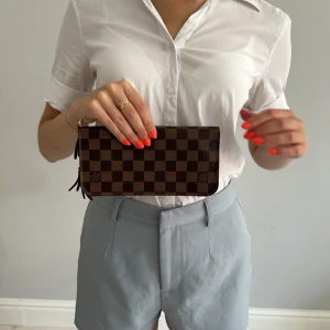 Louis Vuitton Insolite Plånbok/Miniväska  - Vintage. Nyskick.  Garanterar äkthet - pengarna tillbaka annars. Fler foton och info —> pretti.se