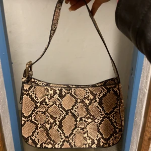 Snakeskin handväska  - Oanvänd