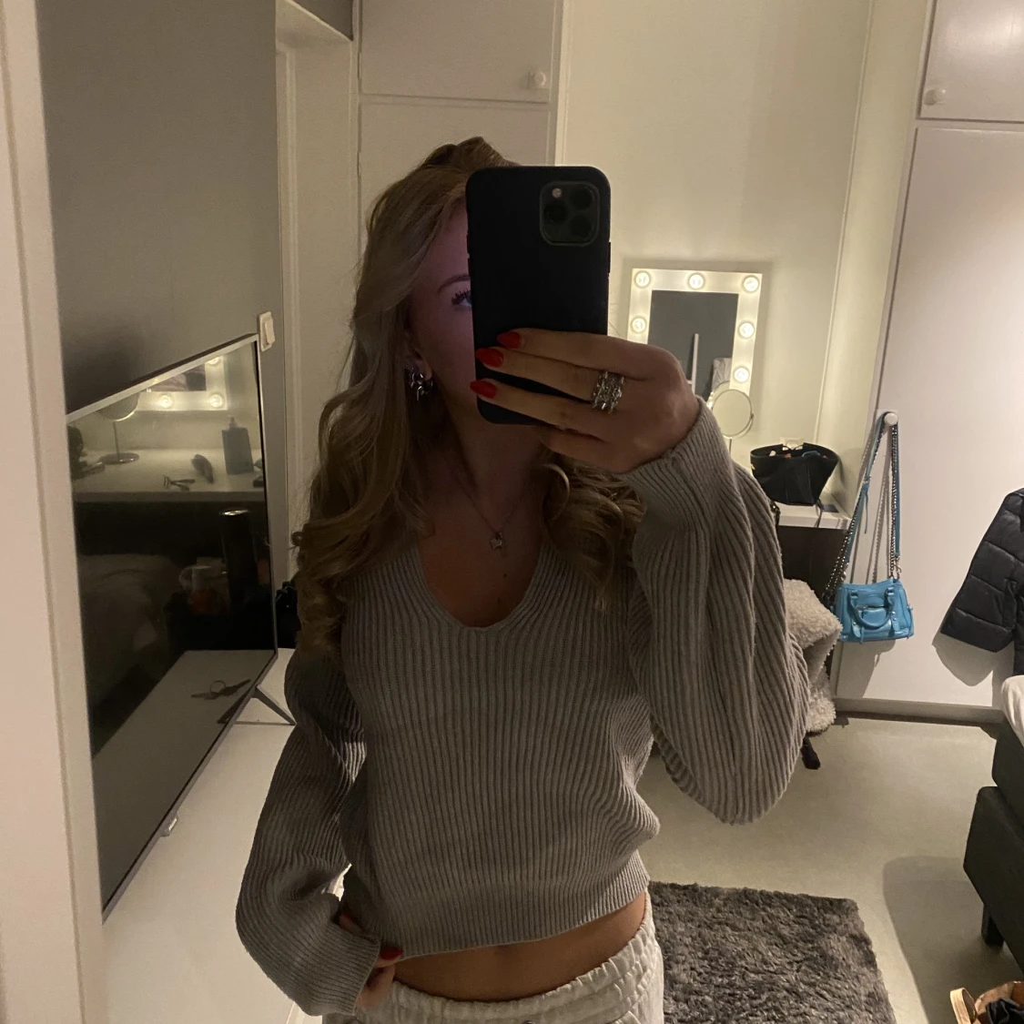 Stickad tröja urringad  - 90