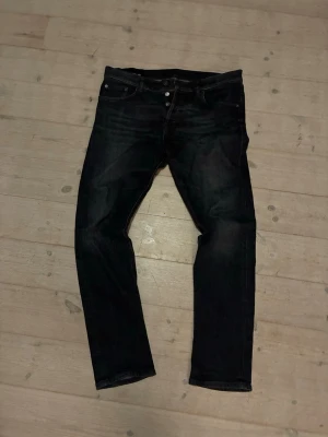 Dondup jeans  - Mörkgrå Dondup jeans storlek W34