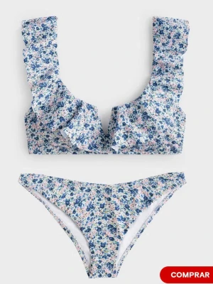 Blommig bikiniöverdel med volangdetaljer - Supersöt bikiniöverdel köpt i Palma som inte går att köpa längre💞💞Aldrig använd! Står ingen storlek, men passar S-M