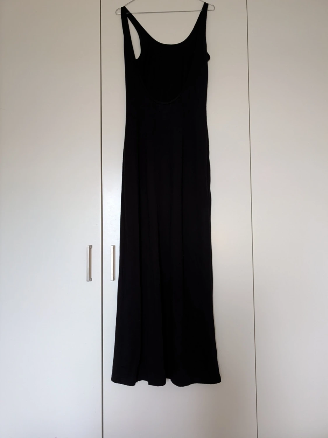 Svart ärmlös jumpsuit med vida ben - 1