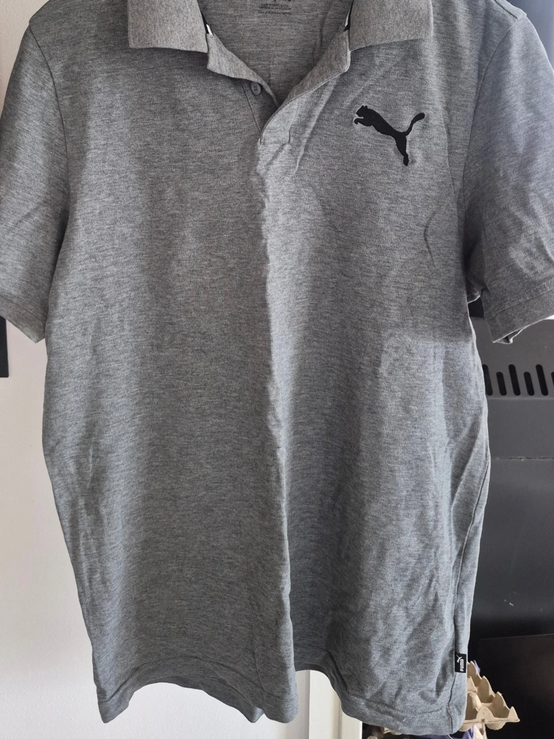 Grå pikétröja från Puma