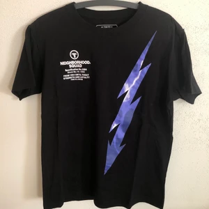 Neighborhood / NBHD Lightning Bolt Tee - Neighborhood / NBHD Lightning Bolt T-Shirt  Size tag large, but fits like a men’s medium / small tee.  Great condition, no flaws or damage.  DM if you need exact size measurements.   Buyer pays for all shipping costs. All items sent with tracking number.   No swaps, no trades, no offers. 