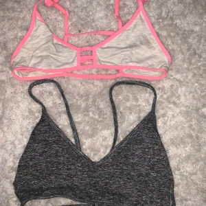 2ST TOPPAR - 2st toppar, en grå från Cubus i strl. XS och en grå/rosa från HM i strl. 34! Båda i perfekt skick och passar till både träning och vardag! 1 för 30 2st för 50kr. Eventuell frakt betalas av köparen! 