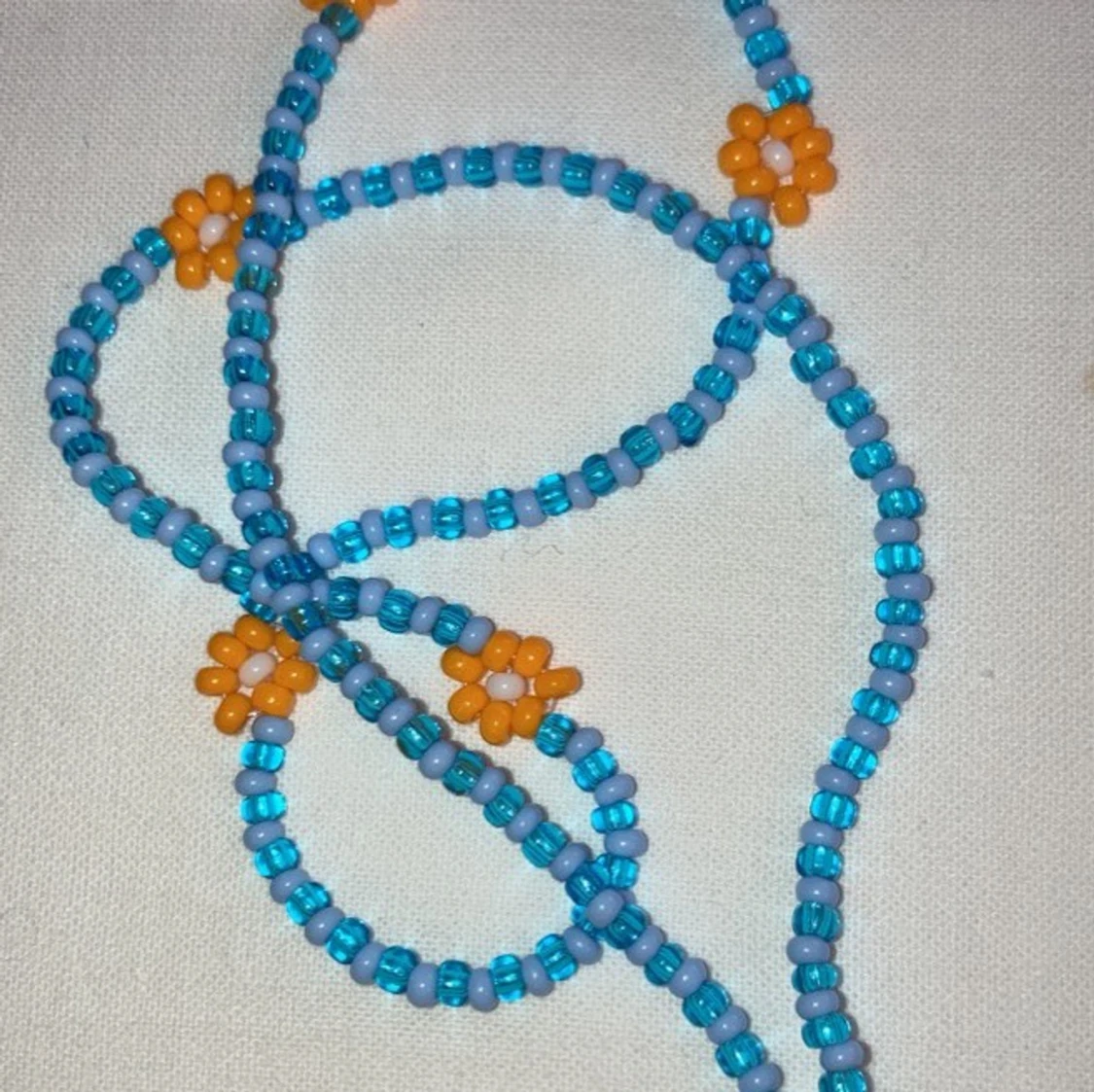 Halsband blommor - 91