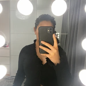 Topp Nelly - Fin svart topp från Nelly. Aldrig använd. Storlek L