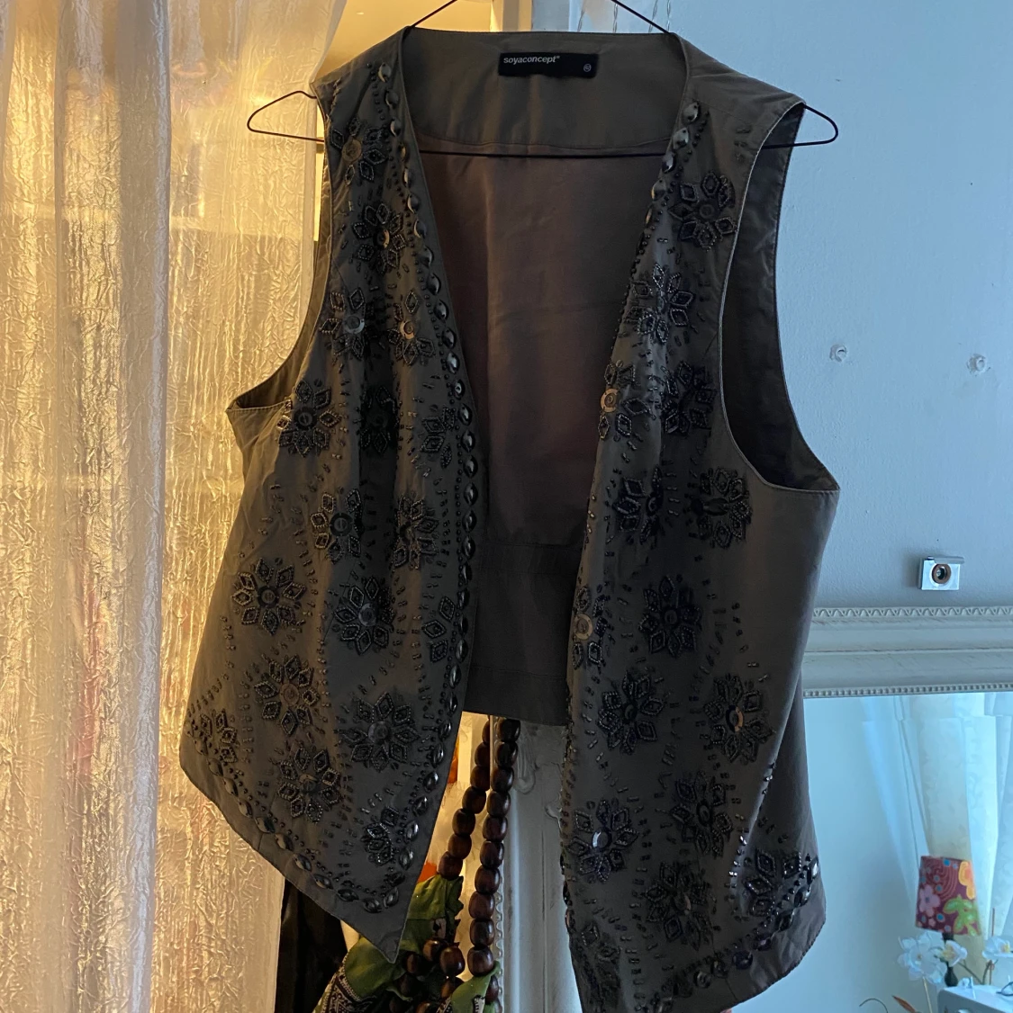 Väst med glitter  - 90