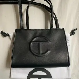 Brand new Telfar Small Black Shopping bag. With dust bag.