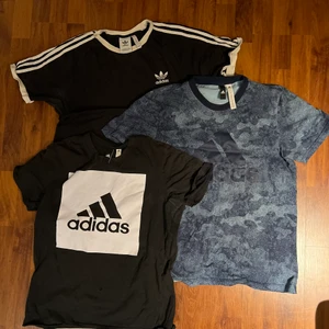 Tre stycken adidaströjor - Tre stycken tröjor i märket adidas. De två översta i storlek L och den understa i storlek M. I använt skick