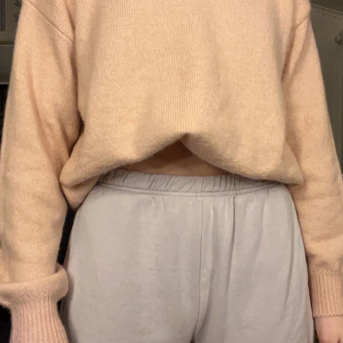 En rosa stickad tröja  - 90