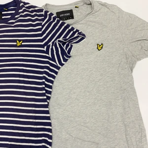 Lyle & Scott T-shirts Blårandig/Grå - Fin kvalité på dessa. Inga skador eller smutsfläckar. Finns i 2 olika färger. Båda är Storlek: M, 100kr/st
