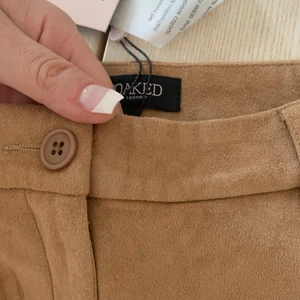 Shorts i mocka - Snygga shorts i mocka som aldrig är använda.