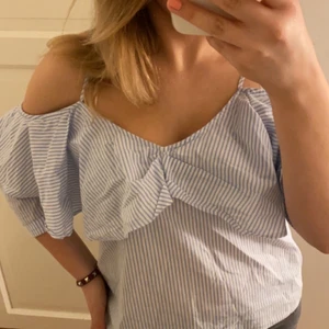 Blus  - Somrig blus från mango 