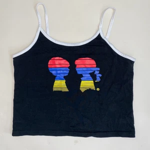 Svart linne med Tryck Storlek XS - Svart linne med tryck på en pojke och en flicka storlek XS. Snygg och bekväm! 