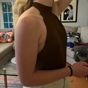 Brun body - Brun body som inte passade mig så den är aldrig använd. 