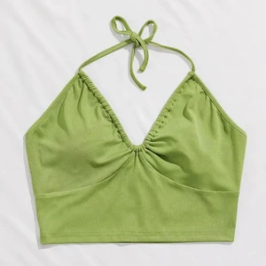 Grön topp - Oanvänd endast testad 1 gång. Passar en strl S. Köpare står för frakt! 