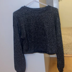 Glittrig tröja - Helt ny glitter tröja använd endast 1 gång på nyår