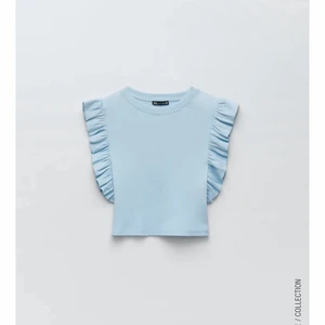 Zara tröja - Jättefin volang top från zara i storlek S, aldrig använd pga råkade beställa 2 st av samma. Snygg ljus blå färg💙