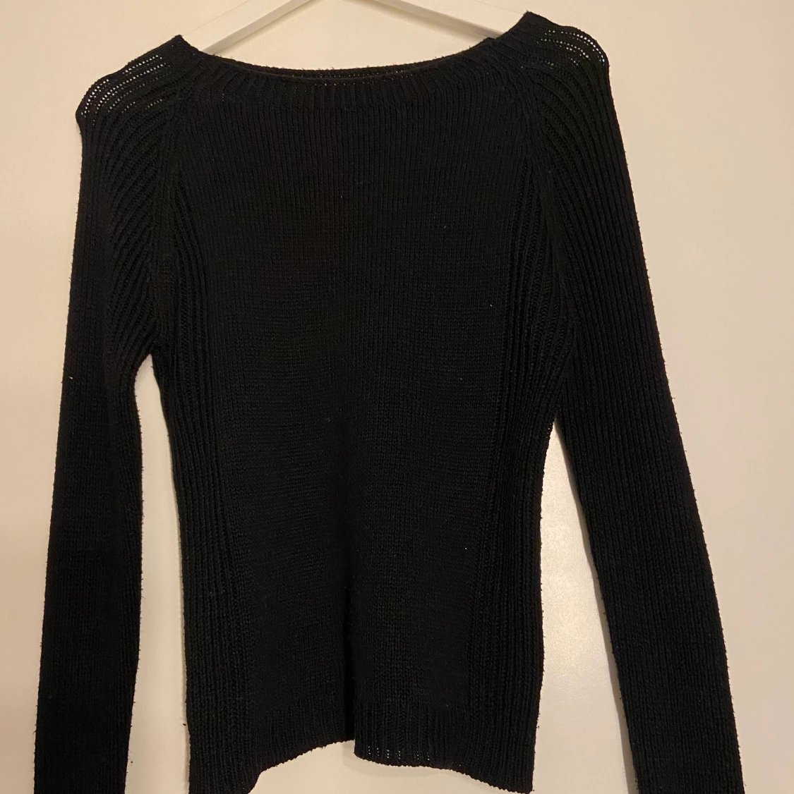 Svart stickad tröja