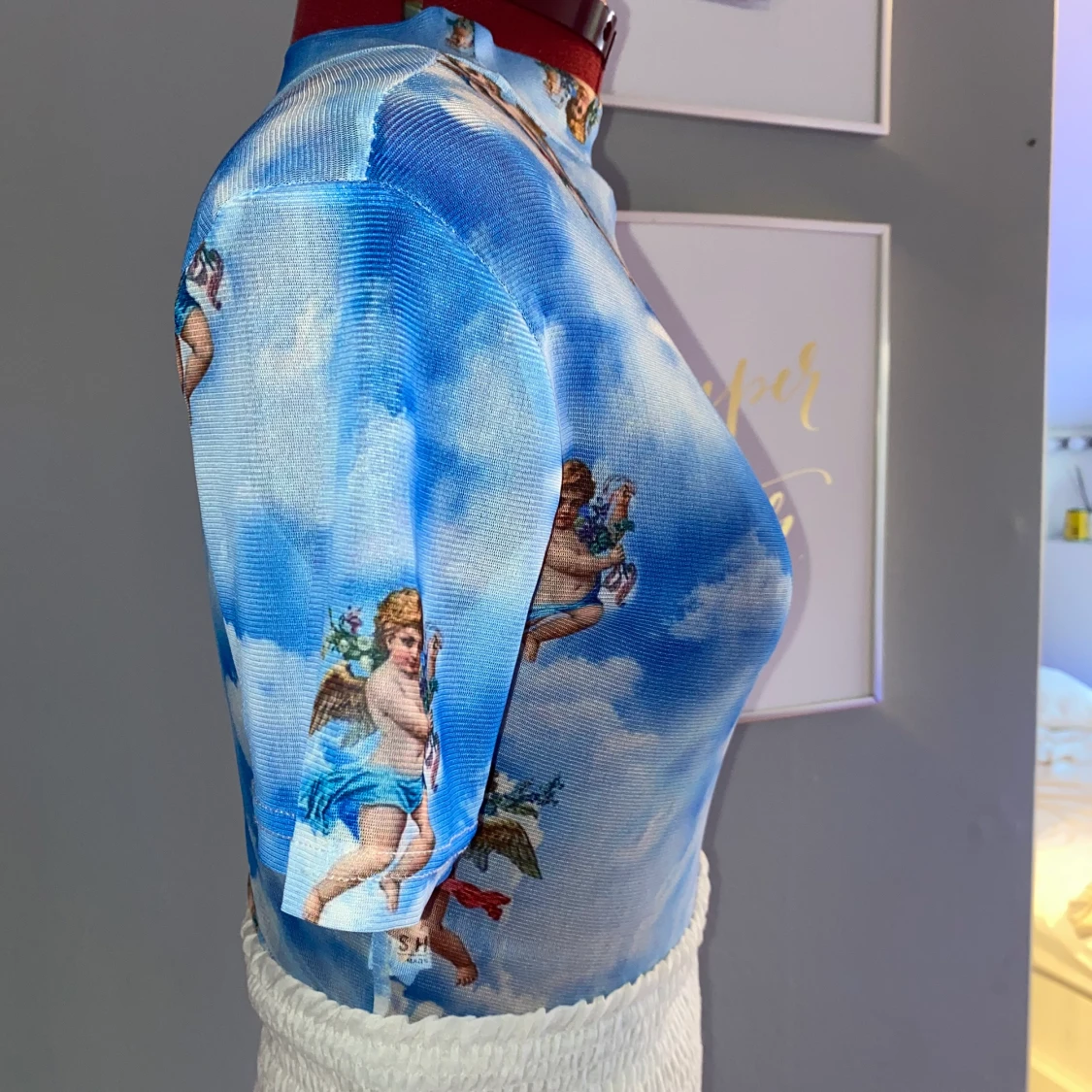 Topp med änglar på - 90