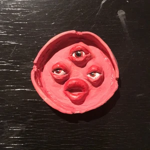 Askkopp  - Man kan också sätta ciggen i dens mun