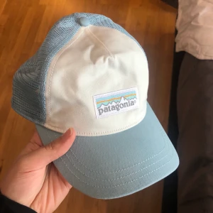 patagonia keps - Pastellblå!! aldrig använd, justerbar, 