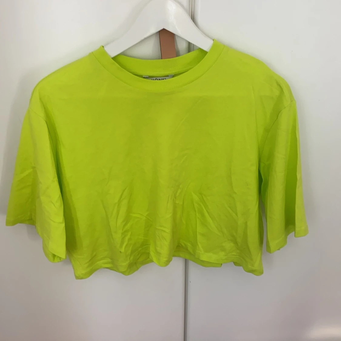 Neongrön magtröja
