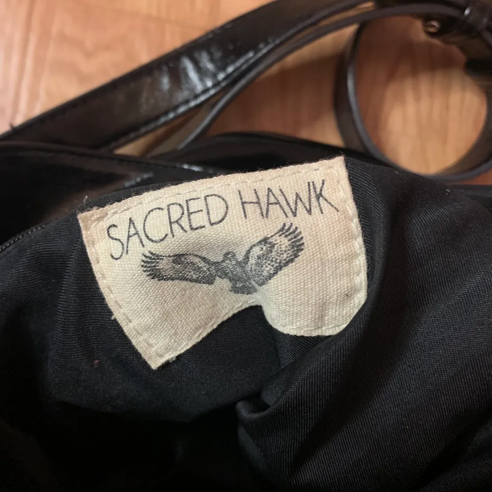 Sacred hawk tiger väska  from Asos ( like new ). Väskor.