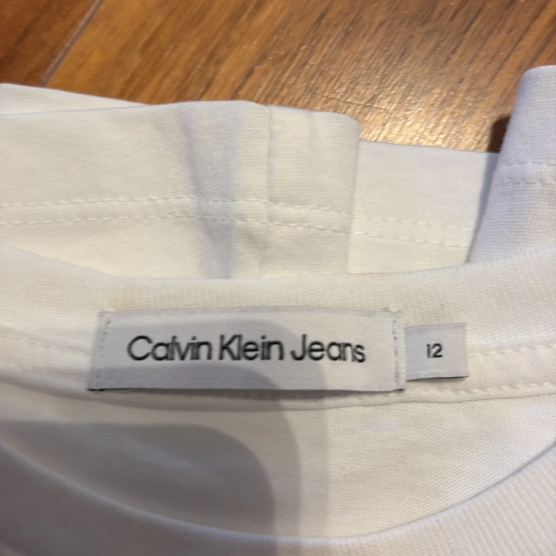 Vit t-shirt från Calvin Klein Jeans - 90