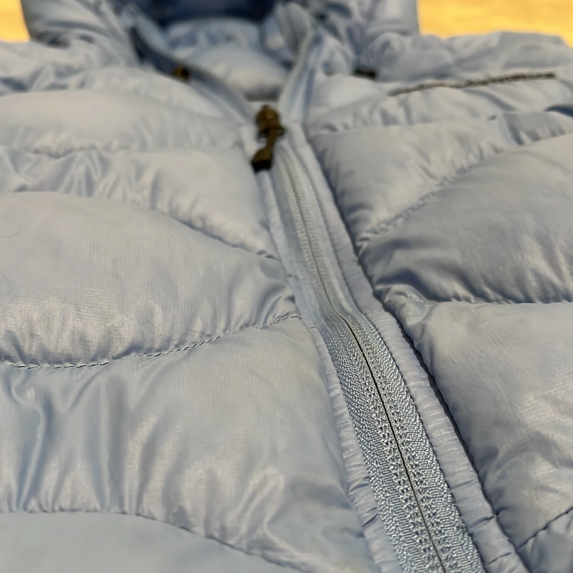 Blå dunjacka från Peak Performance - 90