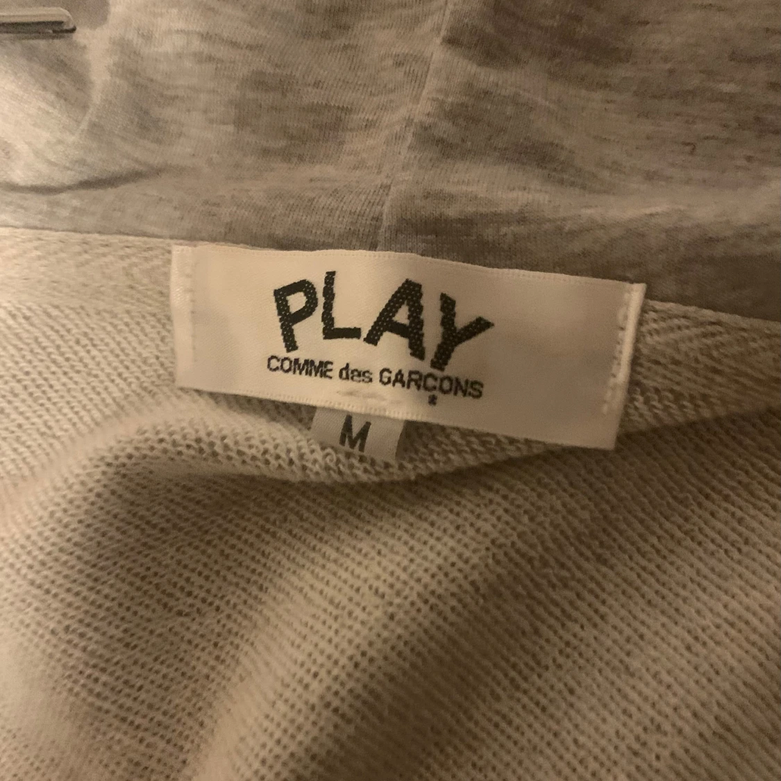 Grå hoodie från Comme des Garçons - 1