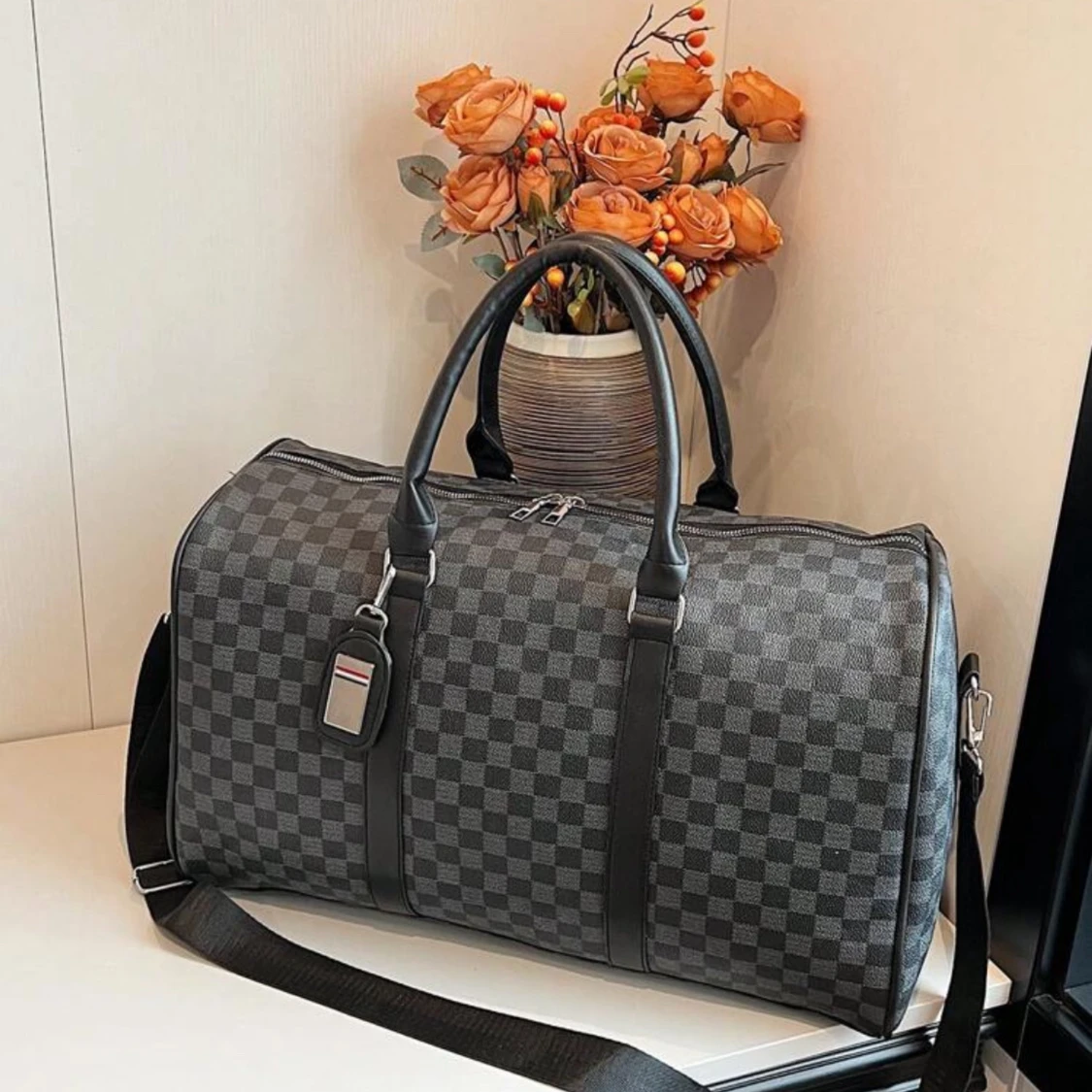 Rutig weekendväska i syntet - 90