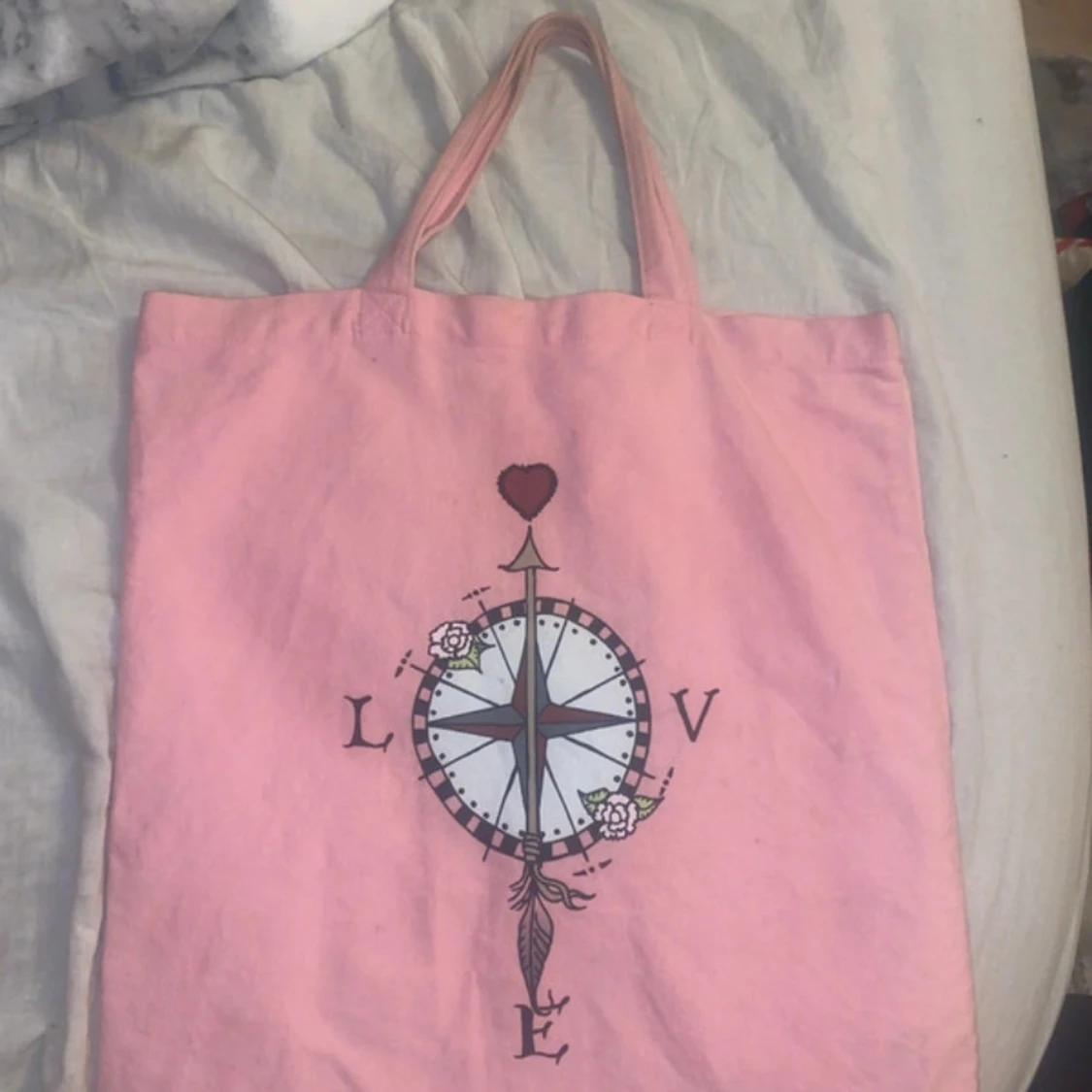 Rosa tygväska med tryck