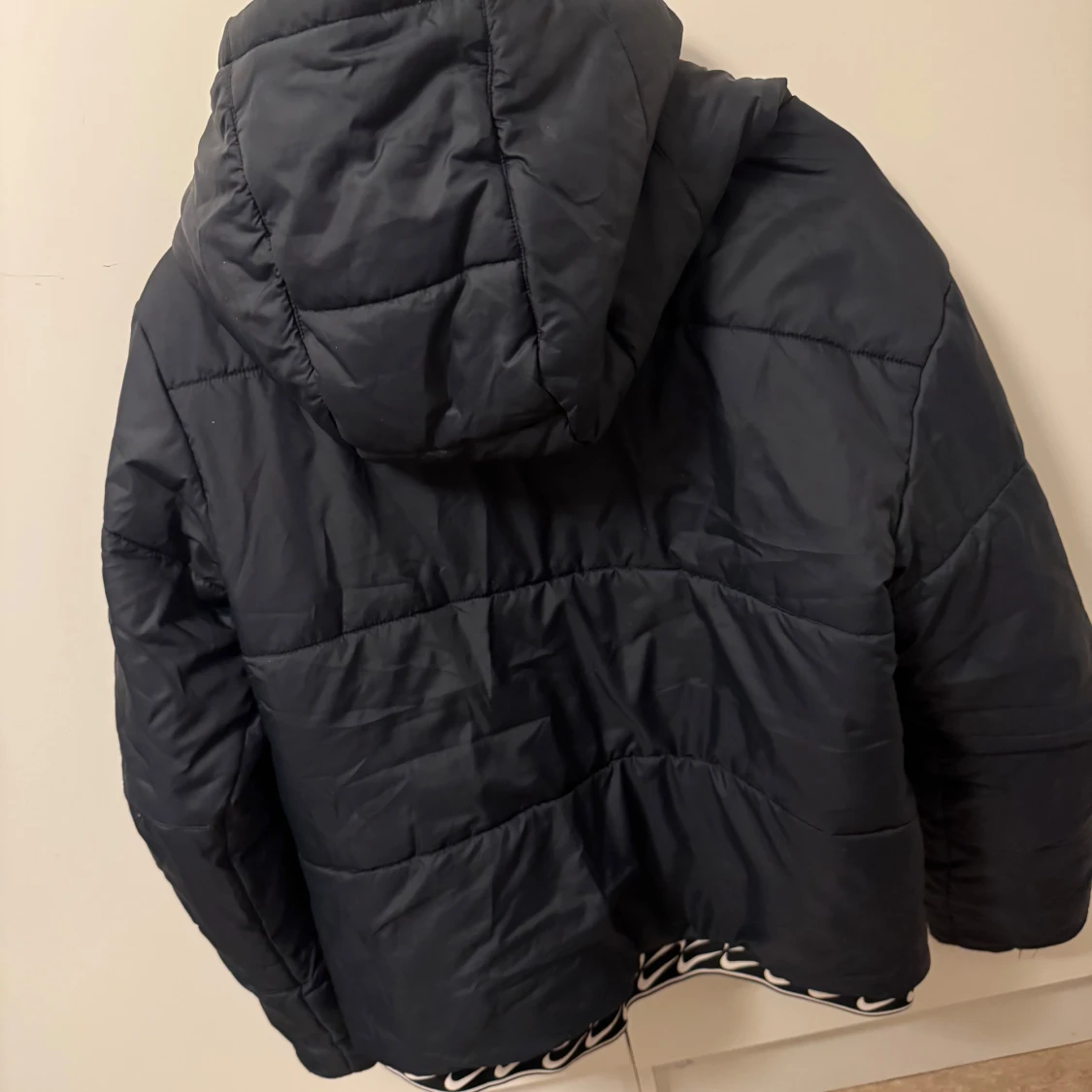 Svart dunjacka från Nike - 90