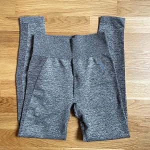 Gymshark tights  - Jättefina grå Gymshark träningstights i storlek M.
