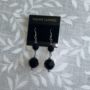 Black earrings with gold - Never worn, new earrings. Comparison to coin in second picture. 