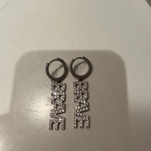 Ioaku örhängen BRAVE - Gott skick, skinande, rena, silver